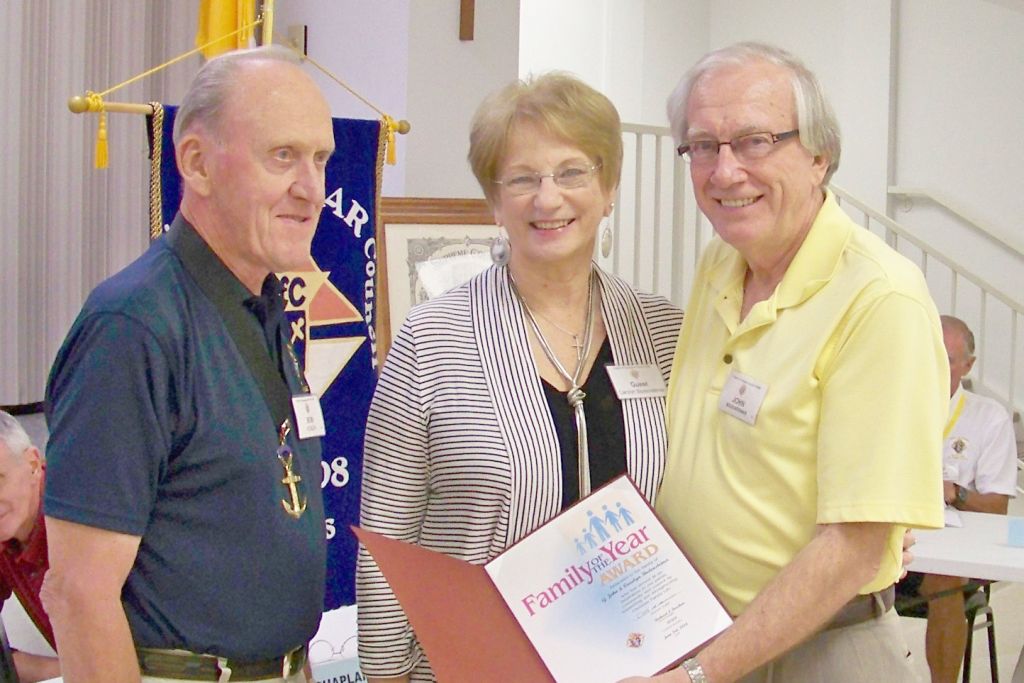 Gand Knight Bob Honzik presents ward to Carolyn and John Bodensteine