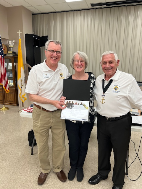 Bob and Ann Bowman receiving the Family of the Monty Award from GK John Weidert